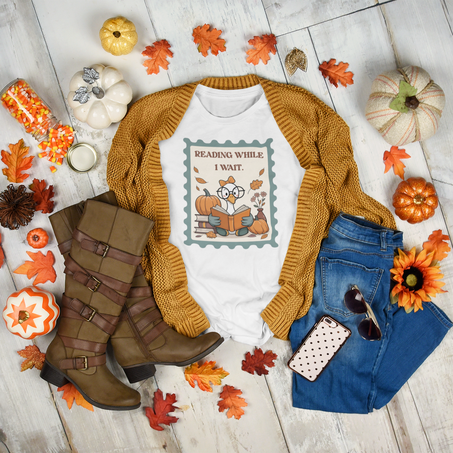 Reading While I Wait t-shirt with goose reading a book, pumpkins, and fall leaves